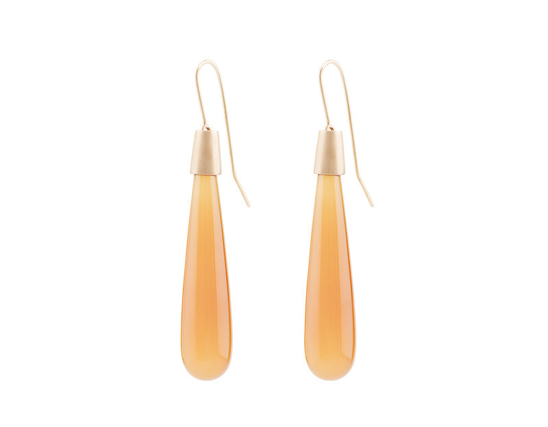 Long pear shaped orange moonstone drops with rose gold caps and shepherd's hooks..