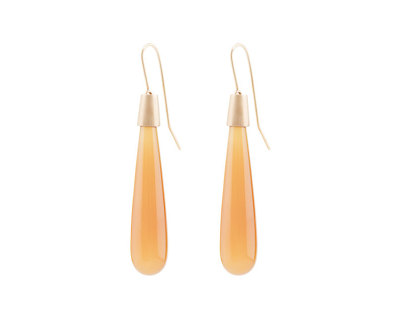 Long pear shaped orange moonstone drops with rose gold caps and shepherd's hooks..