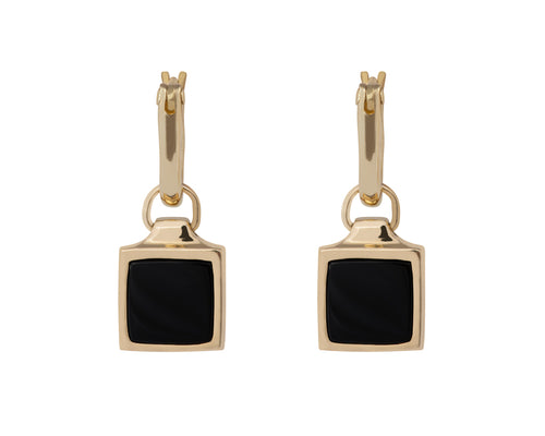 Small square drops in yellow gold set with black onyx. Drops hang from small U shaped hoops in yellow gold.