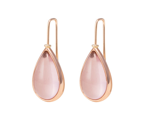 Large tear drop light pink rose quartz cabochons in rose gold frame and shepherd's hooks.