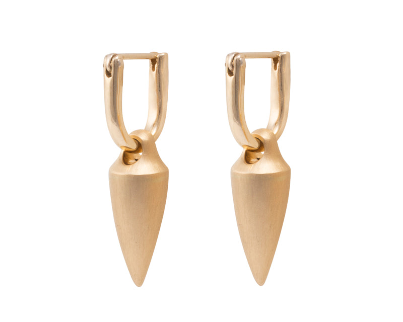 Small pointed pendulous drops in yellow gold, matte finish. Drops hang from small U shaped hoops in yellow gold.