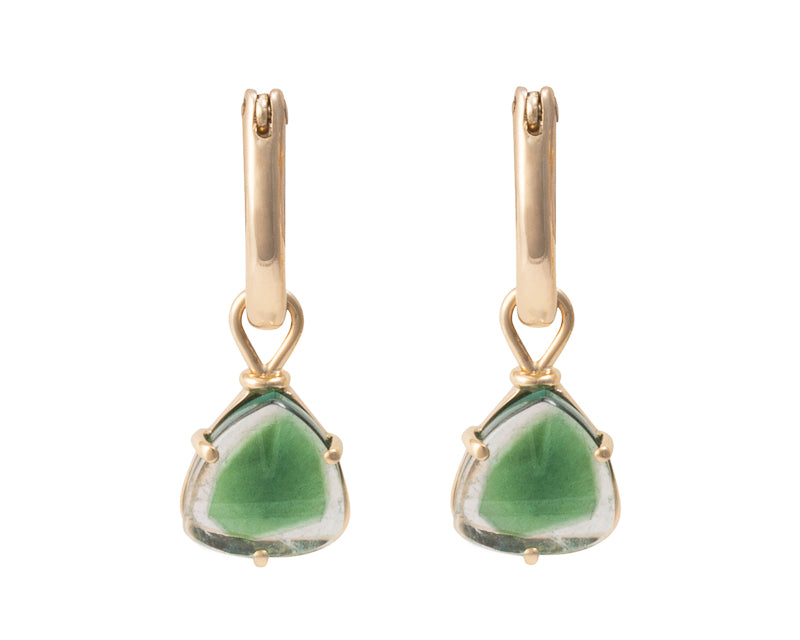 Small triangle shaped clear gems with green centres in yellow gold.. Drops hang on small U shaped hoops in solid yellow gold.