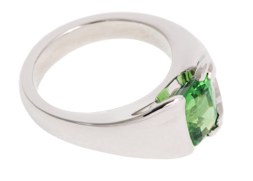 Platinum and green tsavorite garnet ring.