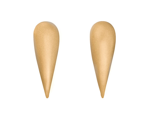Pair of yellow gold studs in an upside down, slightly domed teardrop shape. gold is matte finished.