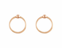 Rose gold hoops hanging on rose gold tiny ball studs.