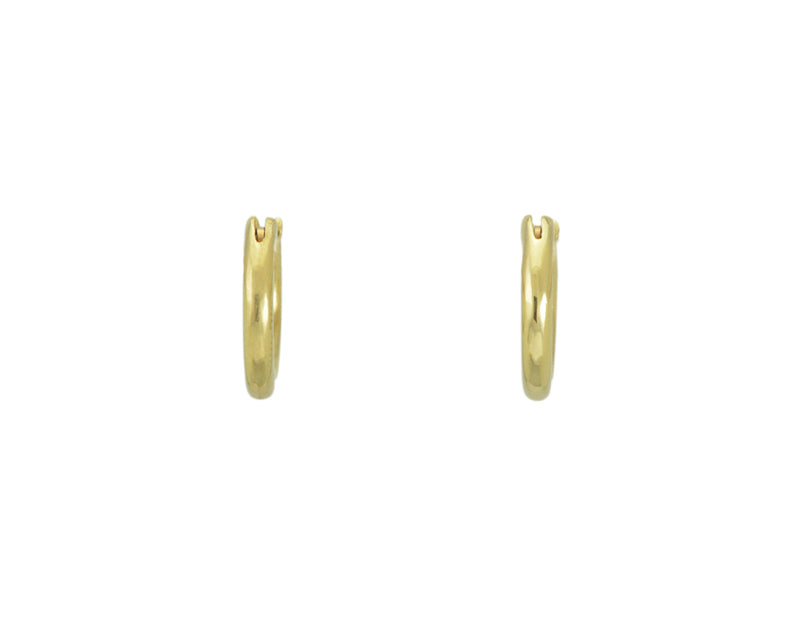 Small U shaped hoops in solid yellow gold.