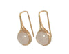 Oval drop earrings in rose gold on shepherd's hooks set with oval pink quartz cabochon gems.