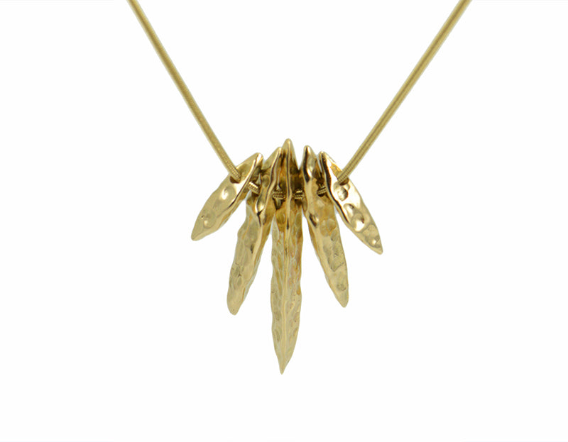 Pendant, solid yellow gold, five separate beads shaped almost like long loaves of bread.