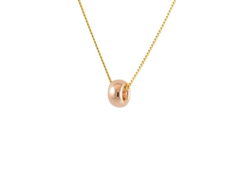One donut-shaped bead in rose gold on chain.