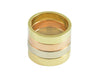 Stack of four flat narrow bands in yellow, white, rose, and green gold.