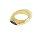 Solid gold ring, with oval face on top and bottom with red and black gems.