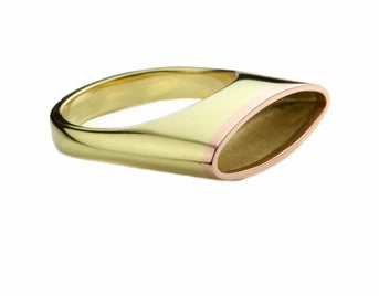 Green gold ring, shaped like oval vessel, rose gold rim.