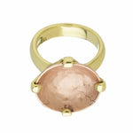 Green gold ring prong set with very large rose gold bowl, hammered texture in bowl.