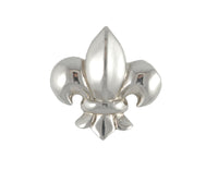 Sterling silver sculpted fleur de lys pendant.