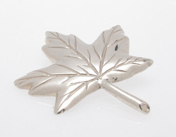 Sterling silver sculpted maple leaf pendant.