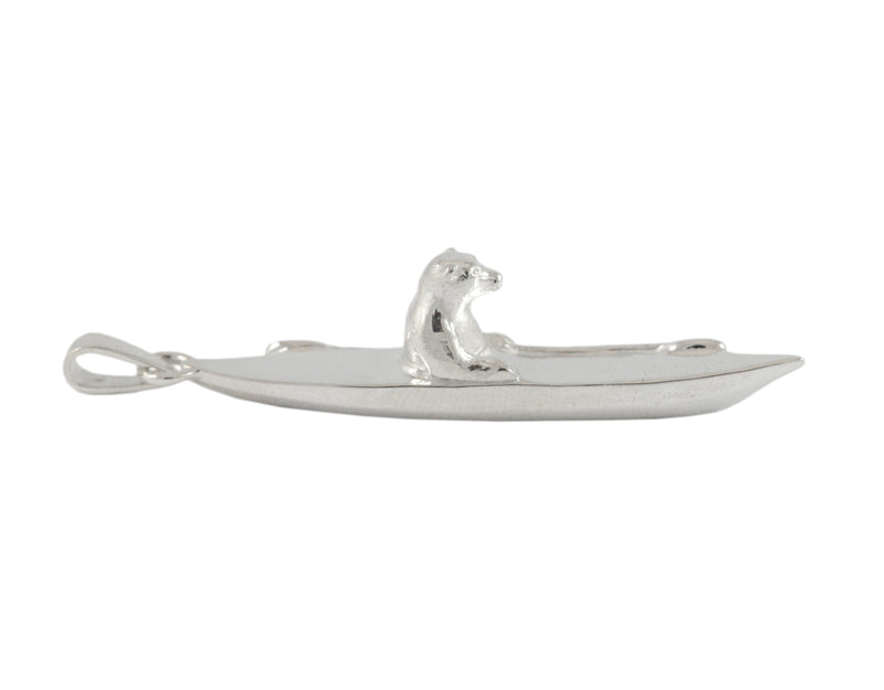 Sterling silver sculpted polar bear in kayak pendant.