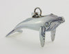 Sterling silver sculpted humpbacked whale pendant.