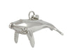 Sterling silver sculpted humpbacked whale pendant.