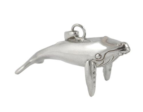 Sterling silver sculpted humpbacked whale pendant..