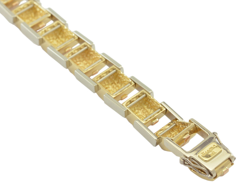 Solid rose, white, yellow 18k gold link bracelet.