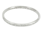 Silver bangle, round wire, with engraved text.