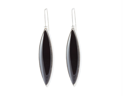 Very long silver drop earrings, pointed at both ends, set with black onyx.