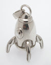 Sterling silver sculpted rocket pendant.