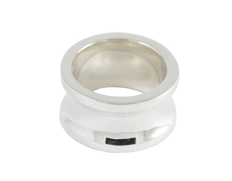 Ver heavy wide silver band with rims on edges.