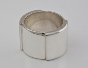 Very wide silver band.