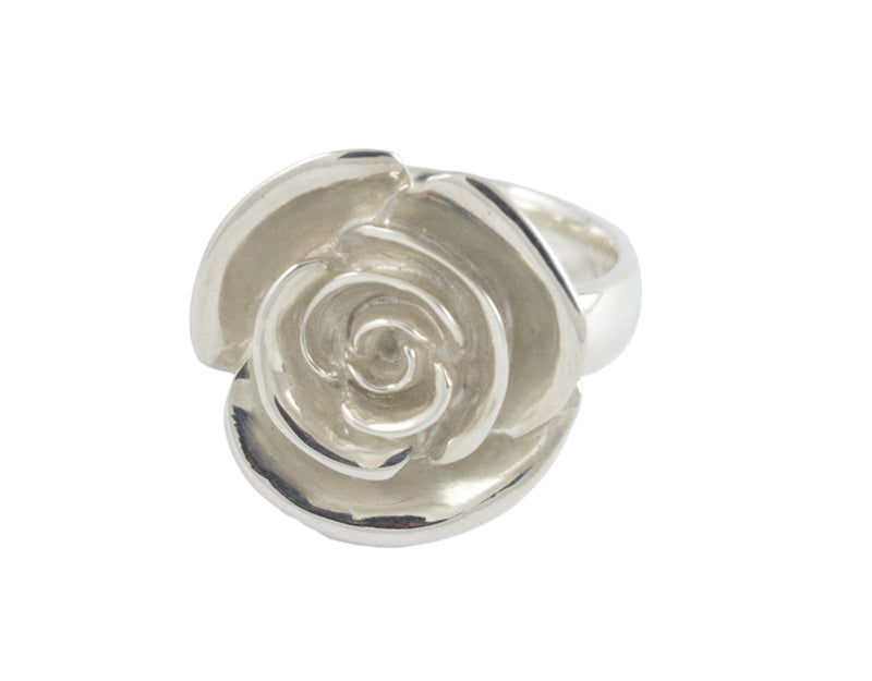 Large silver ring in shape of carved rose. Frosted.