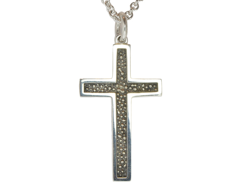 Very large silver cross pendant, blackened.  Hung on silver chain.