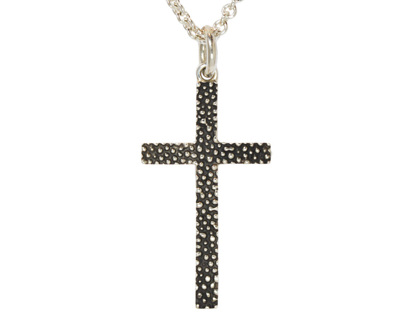 Very large silver cross pendant, blackened.  Hung on silver chain.