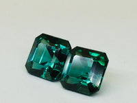 Indicolite tourmaline against white background.