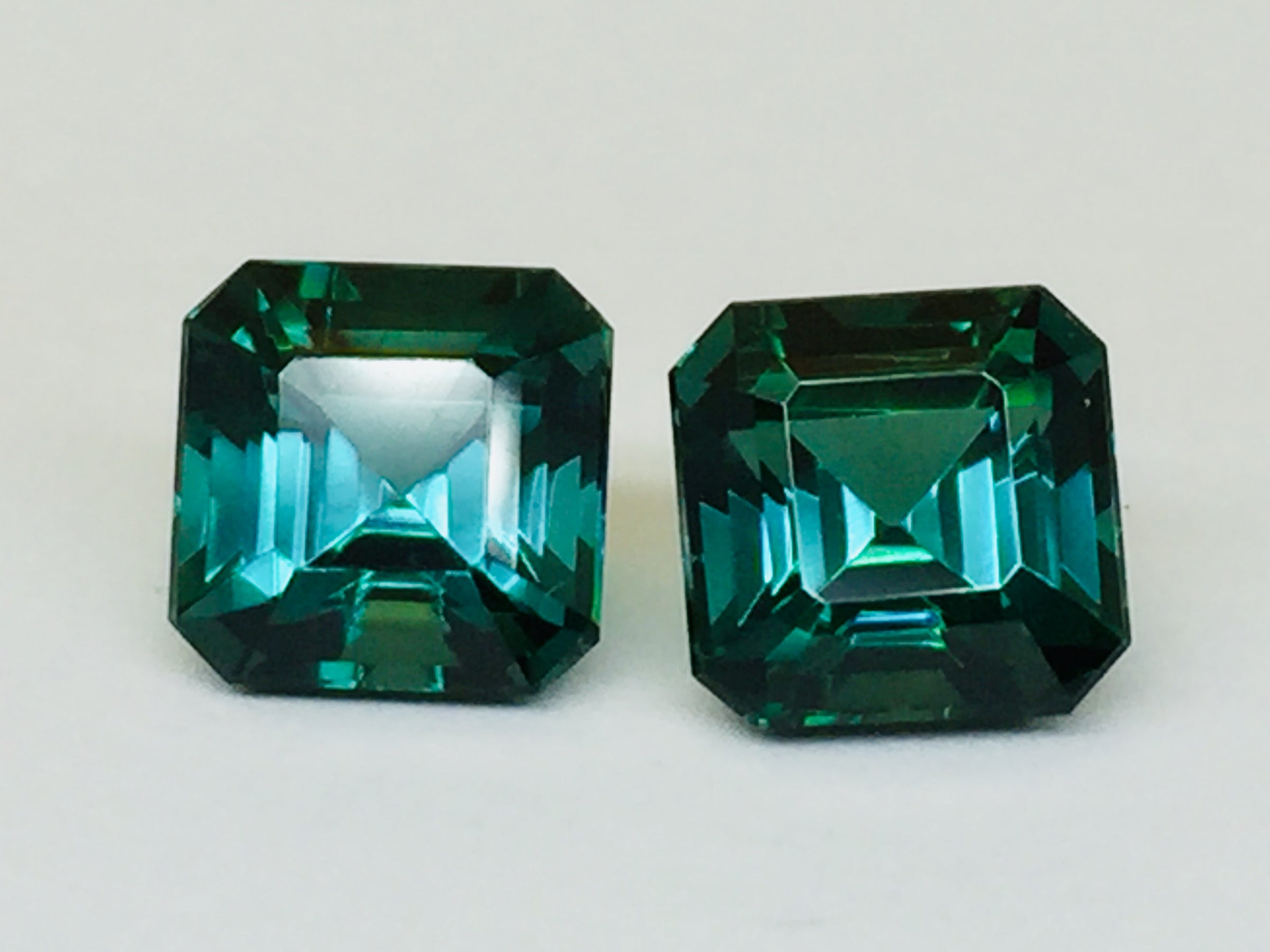 Indicolite tourmaline against white background.