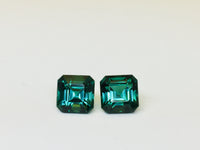 Indicolite tourmaline against white background.
