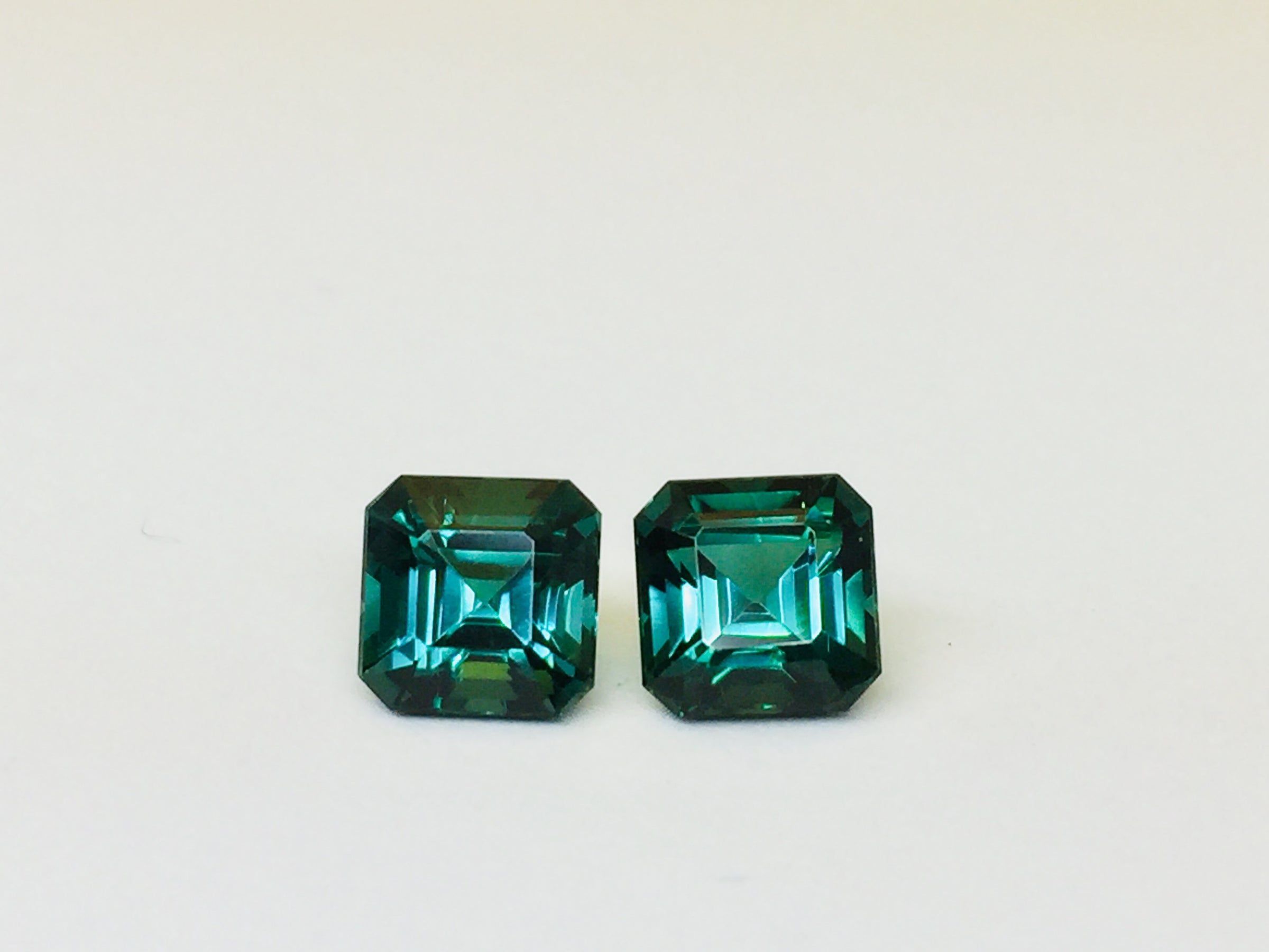 Indicolite tourmaline against white background.