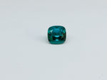 Indicolite tourmaline against white background.