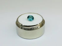 Indicolite tourmaline against white background.