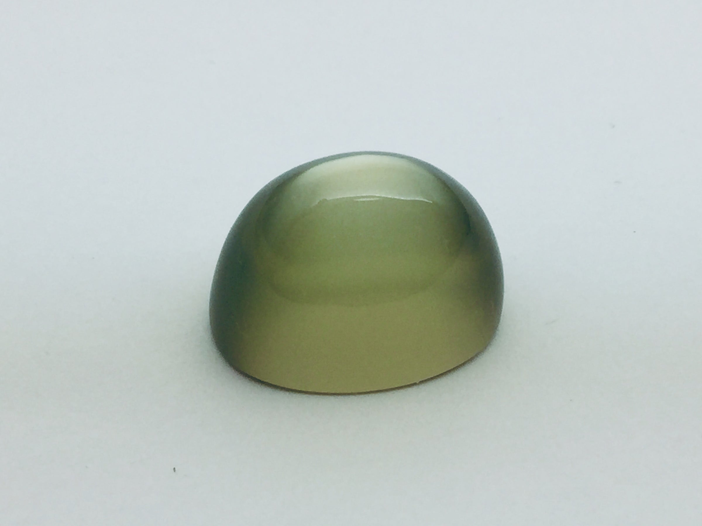 Green moonstone, white background.