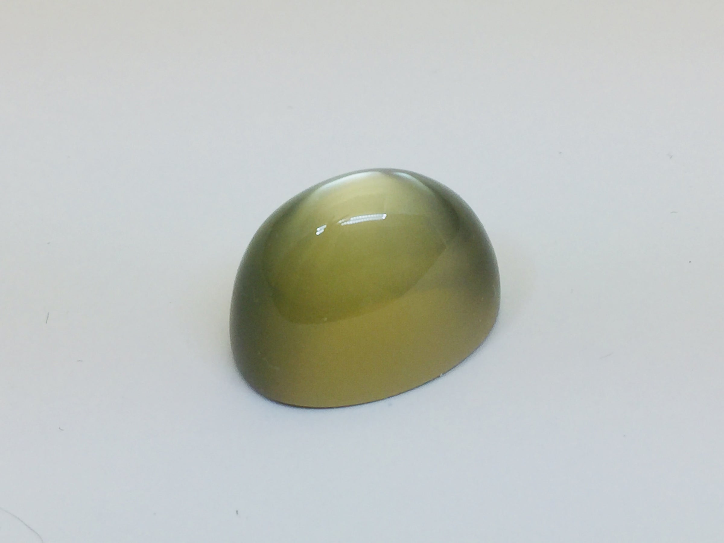 Green moonstone, white background.