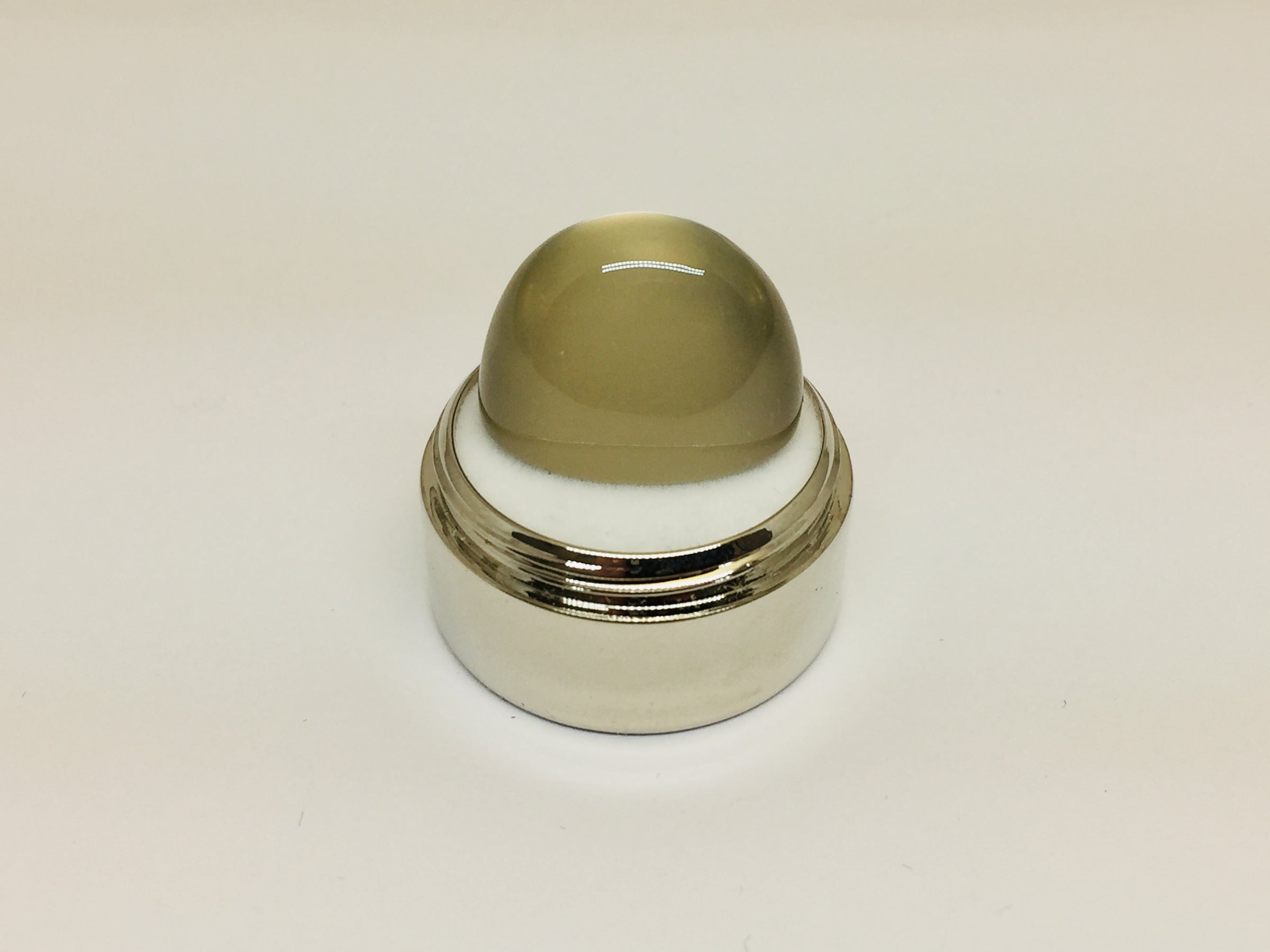 Green moonstone, white background.