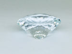Very large, colourless topaz, white background.