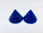 Lapis lazuli pair of cone-shaped gems, white background.