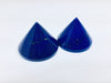 Lapis lazuli pair of cone-shaped gems, white background.