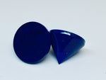 Lapis lazuli pair of cone-shaped gems, white background.