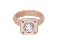 Rose gold ring large diamond, pink sapphires.