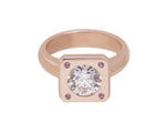 Rose gold ring large diamond, pink sapphires.