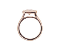 Rose gold ring large diamond, pink sapphires.
