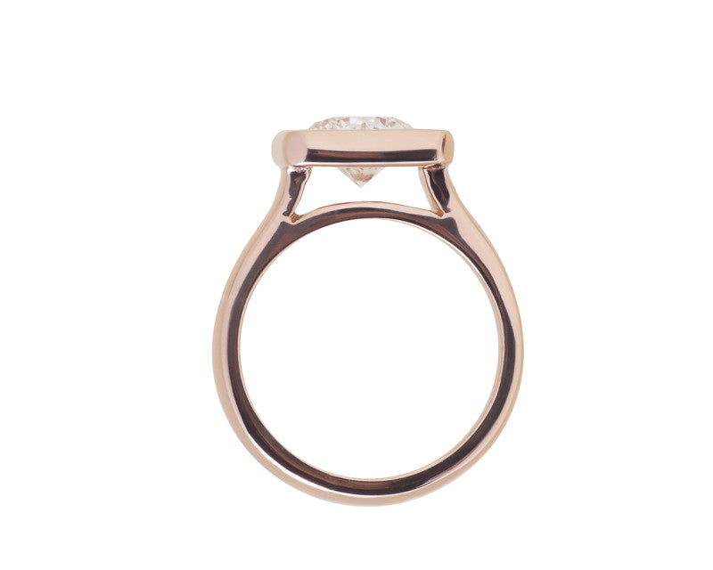 Rose gold ring large diamond, pink sapphires.
