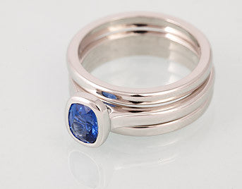 Platinum ring with rectangle sapphire, matching bands.